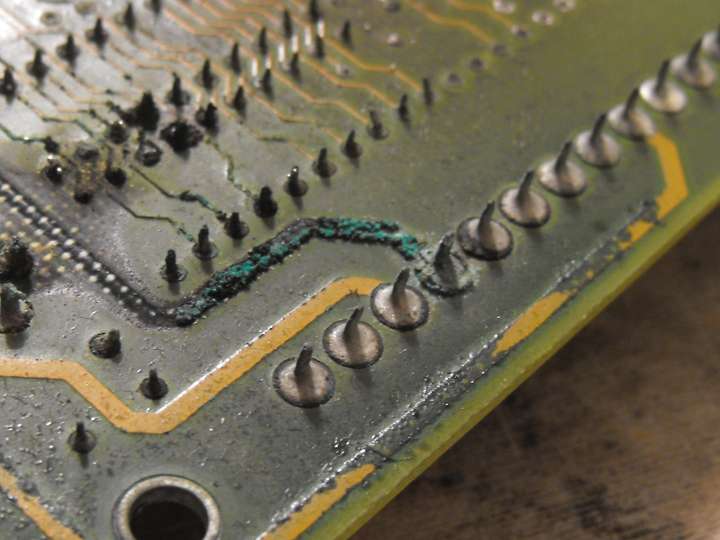 Corrosion on a motherboard caused by a CMOS battery